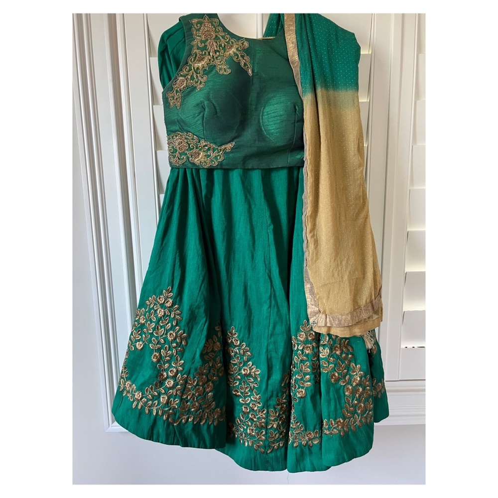 Dark green and golden lehenga